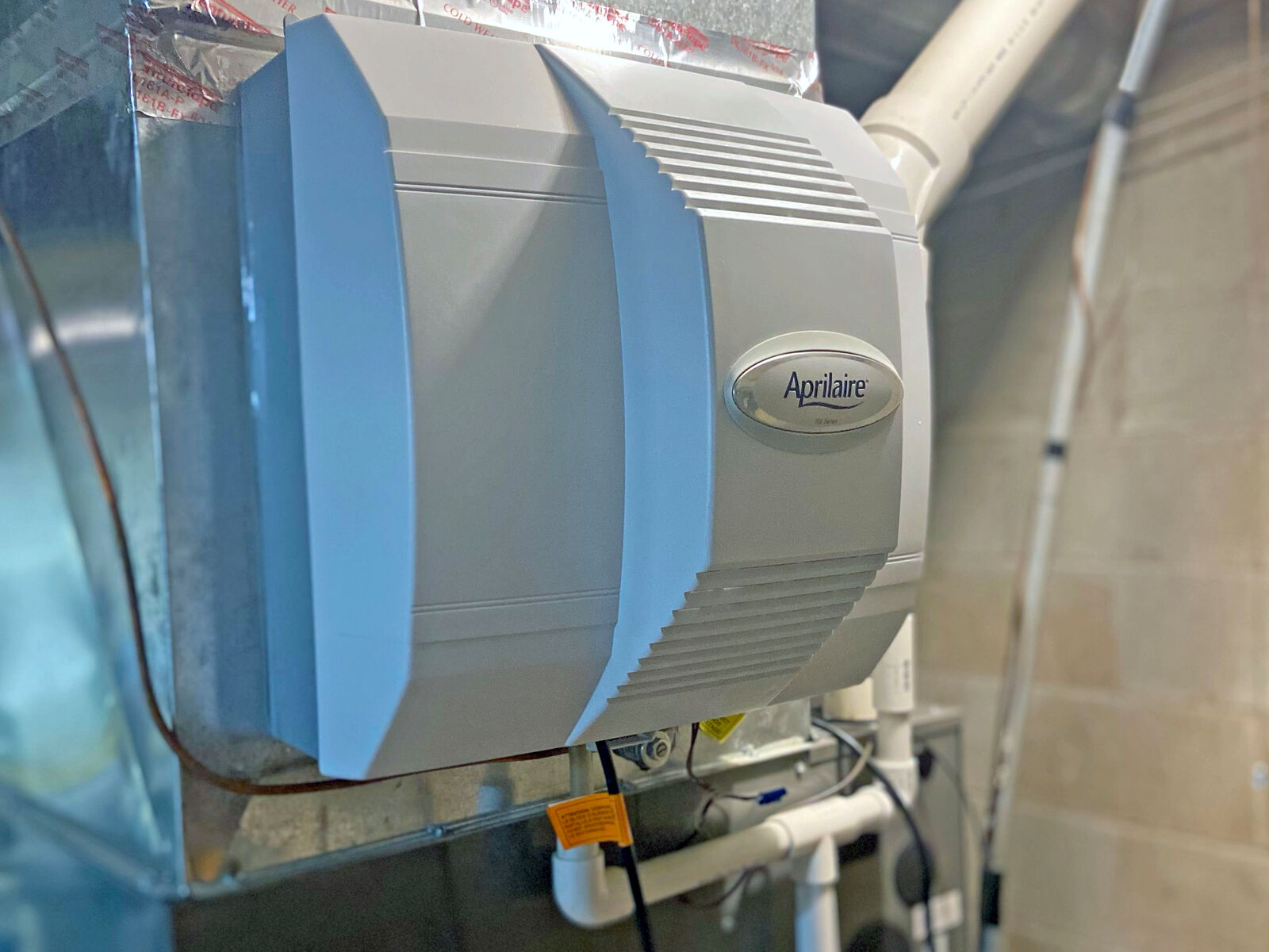 A newer hvac-mounted humidifier unit